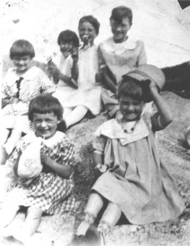 328: l-r front Madonna Healey and Reen McCarthy, back Teresa Healey, Cede McCarthy, Teresa McCarthy  and Anne McCarthy. Cede, Anne and Reen's dresses designed by Mary Anne Barry. (circa 1931)  - Madonna and Teresa daughters of Peter Healey &amp;amp; Mary Reddy; Teresa daughter of Thomas McCarthy  &amp;amp; Elizabeth Carroll; Reen, Cede and Anne daughters of James McCarthy &amp;amp; Julia Reddy